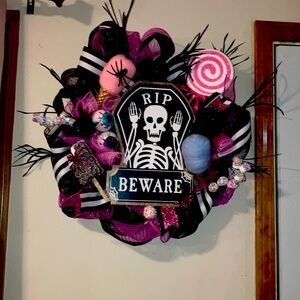 Homemade Halloween Skeleton Wreath with Pink and Black Accents